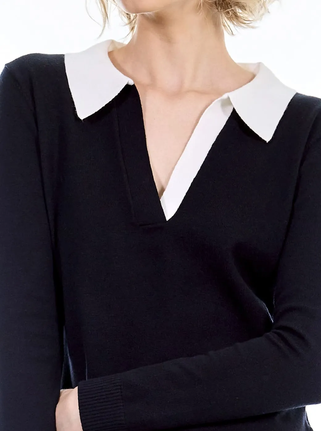 Suéter negro cuello sport V Esenciales