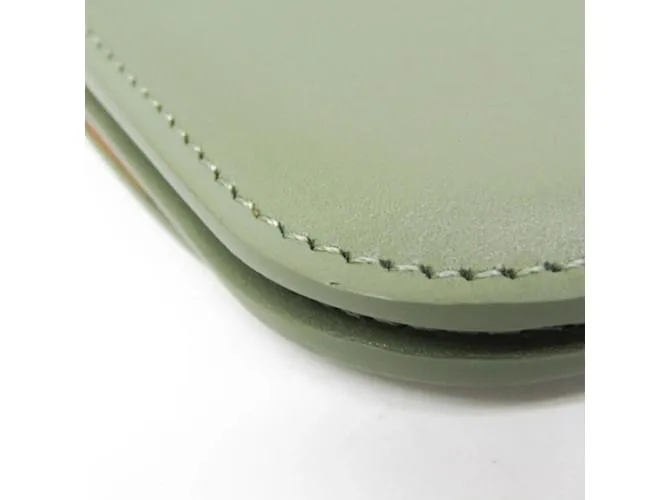 Tarjetero Loewe Goya en cuero verde 